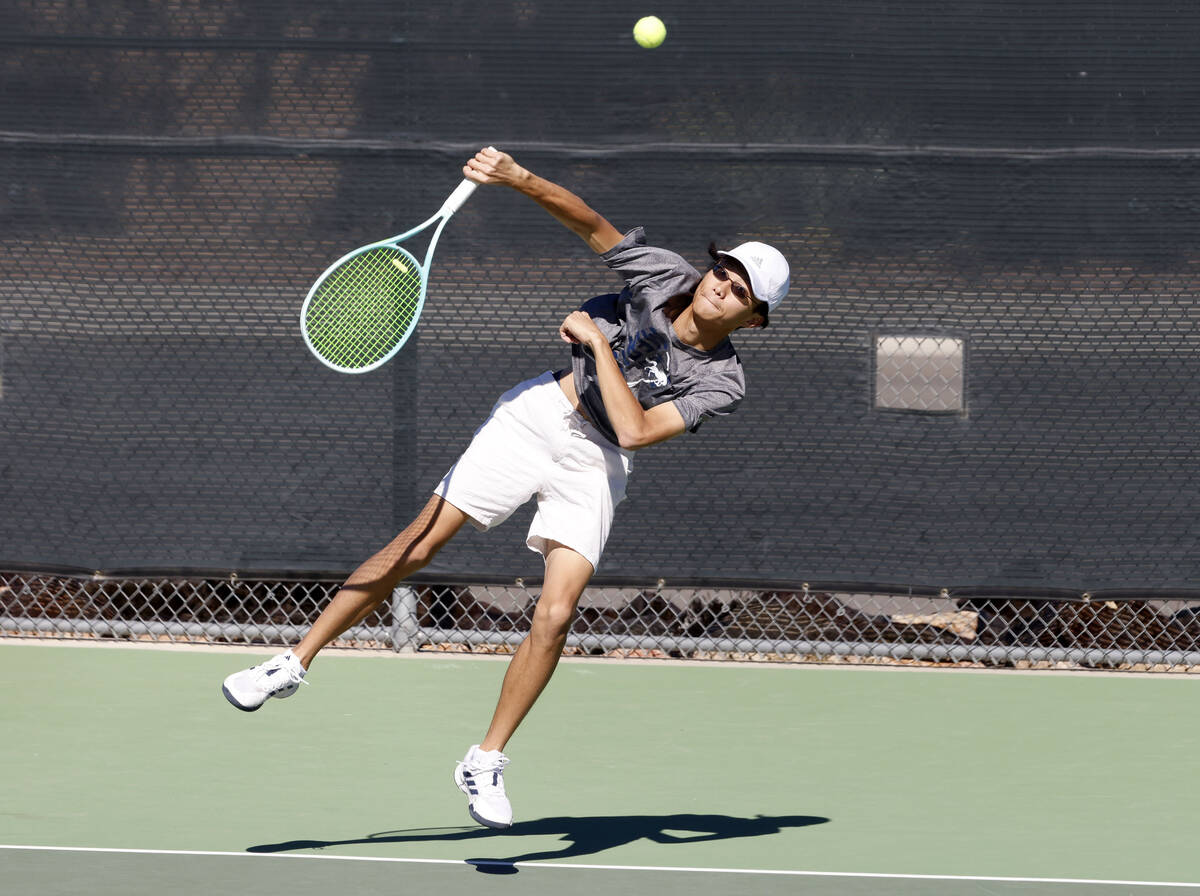 The Meadows Steven Tian serves against Liberty during the Class 4A boys tennis team State Champ ...