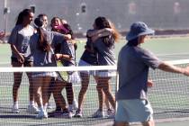 The Meadows girls' tennis team celebrates after defeating Spanish Springs in the Class 4A ...