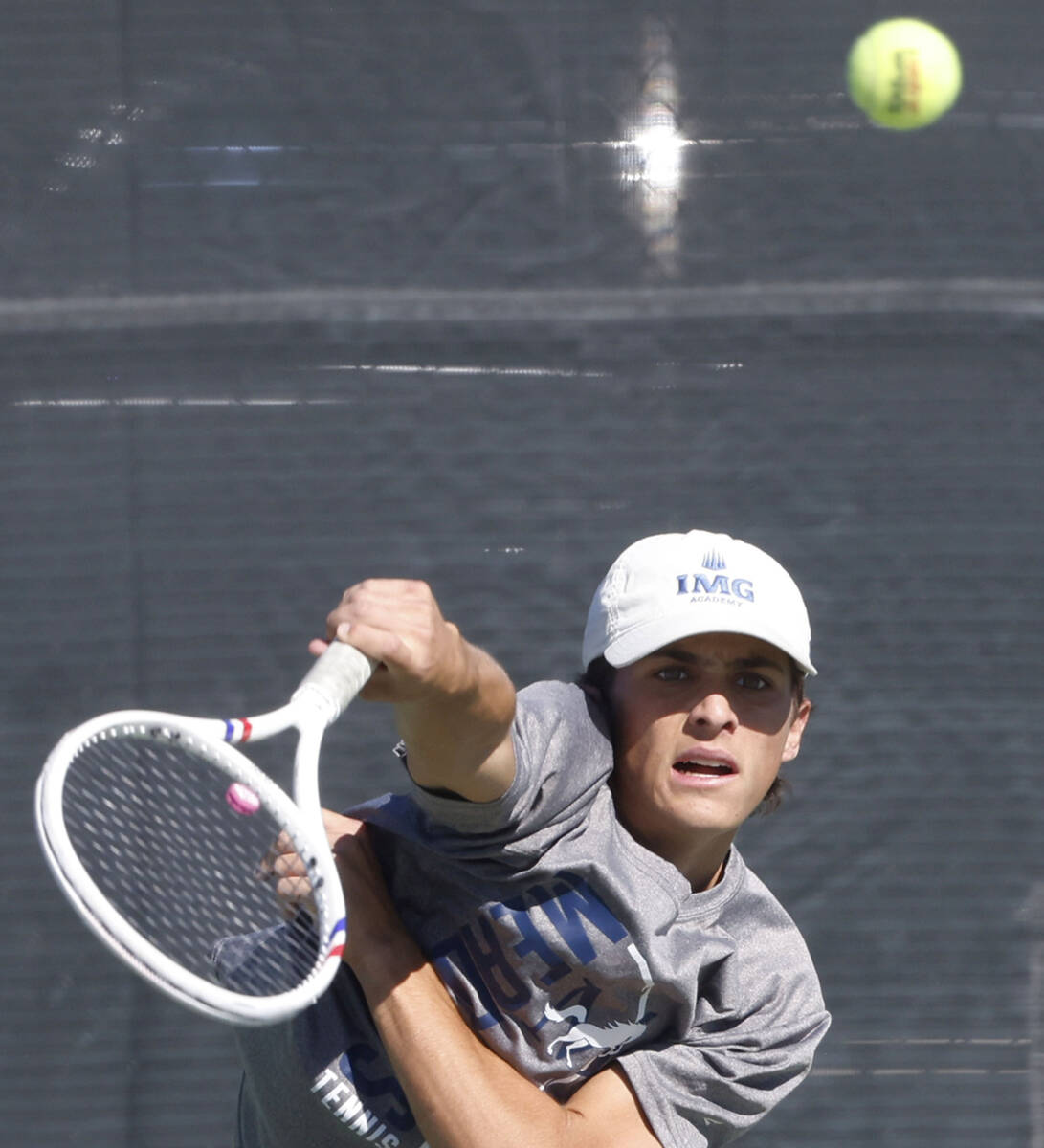 The Meadows Jacob Garber serves during the Class 4A boys tennis team State Championship match a ...
