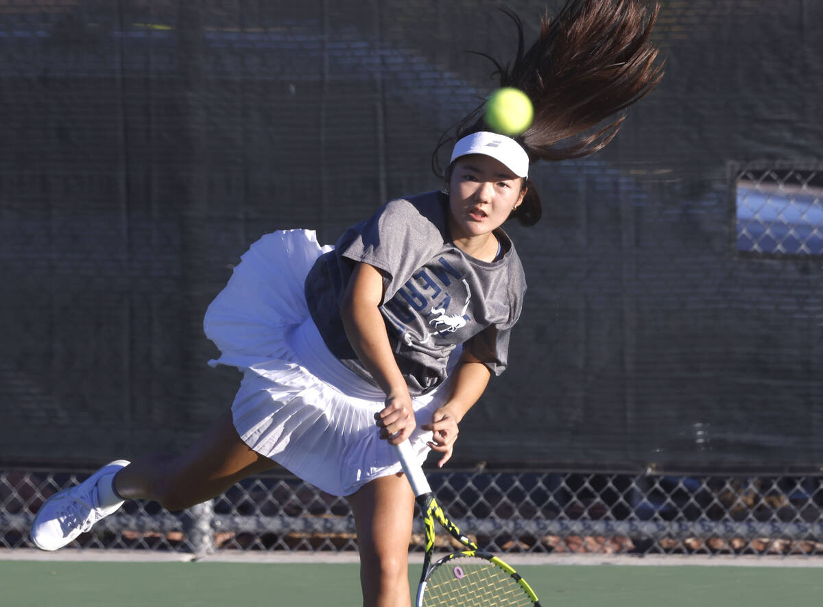 The Meadows Somi Song serves against Spanish Springs during the Class 4A girls tennis team Stat ...