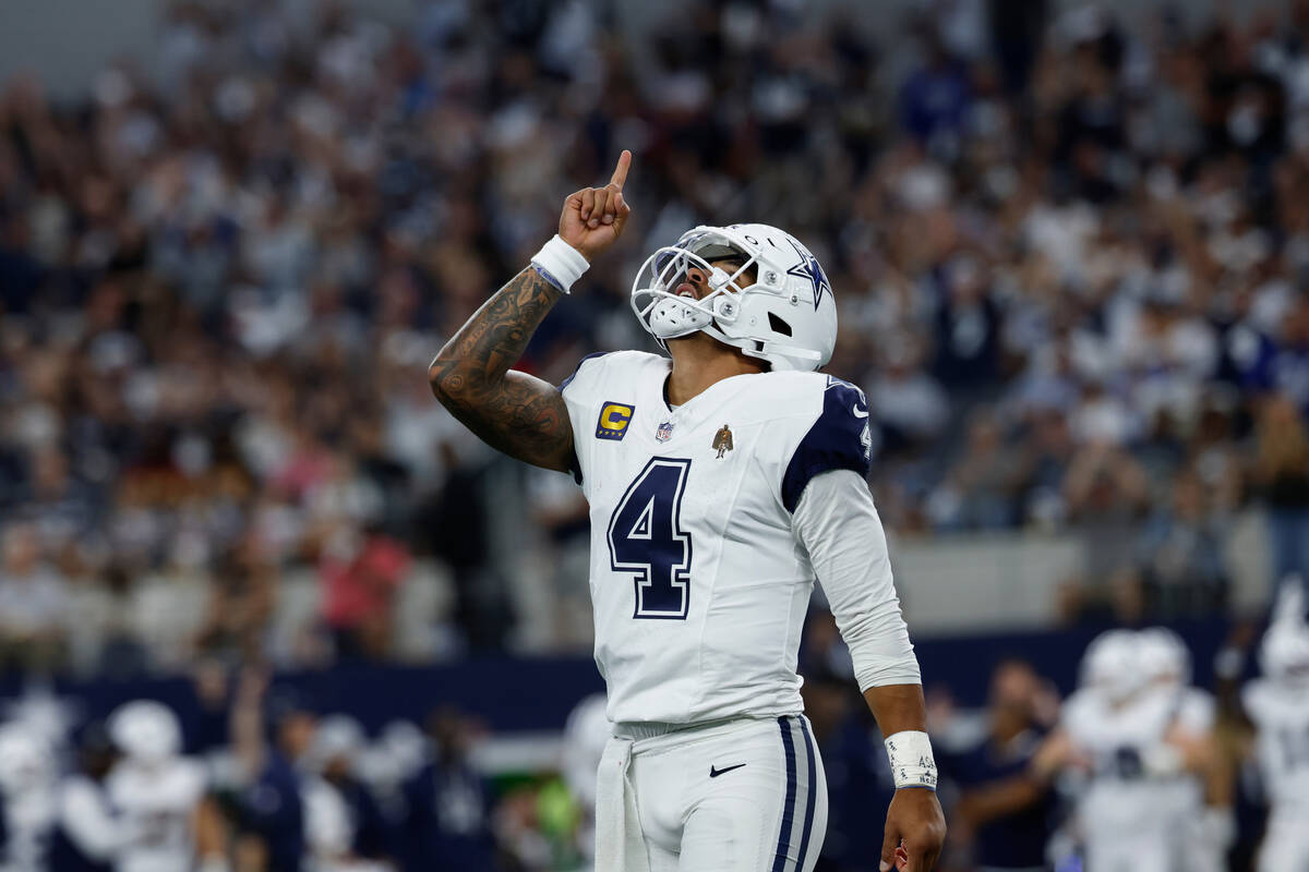 Dallas Cowboys quarterback Dak Prescott (4) celebrates after a touchdown during a NFL football ...