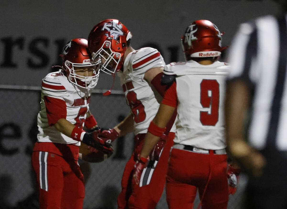 Arbor View's wide receiver Jayden Williams (6) celebrates his touchdown with tight end Zac ...