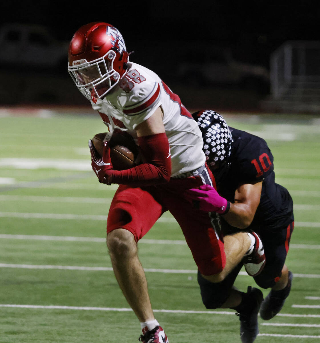Las Vegas High's linebacker Chris Fernandez (10) attempts to take down Arbor View's t ...