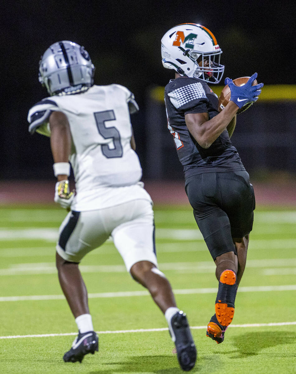 Mojave's S'marion Coleman (3)catches a deep pass over Palo Verde's Cory Hood (5) ...