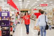 Store director Enid Corso greets an employee at Target at 350 Lake Mead Pkwy in Henderson on Fr ...