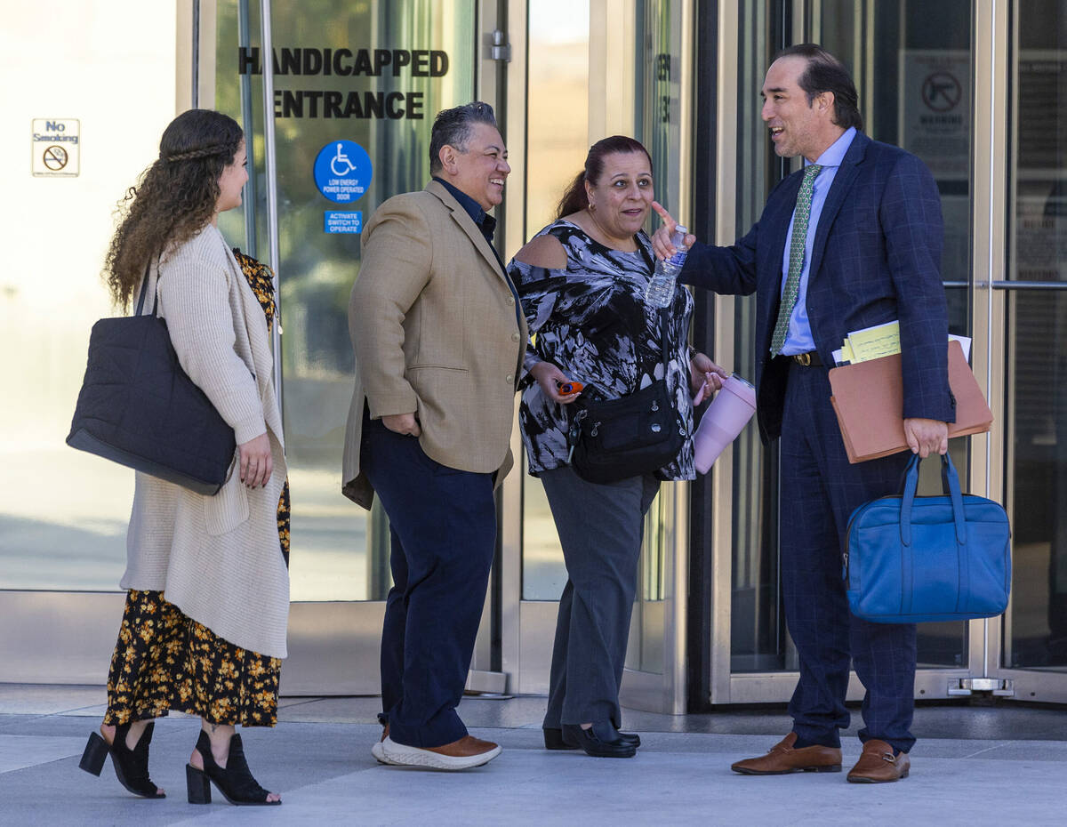 (LtoR) Jazmin Gomez, Rene, and Jeanne Llera talk with their attorney Eric Valenzuela outside th ...