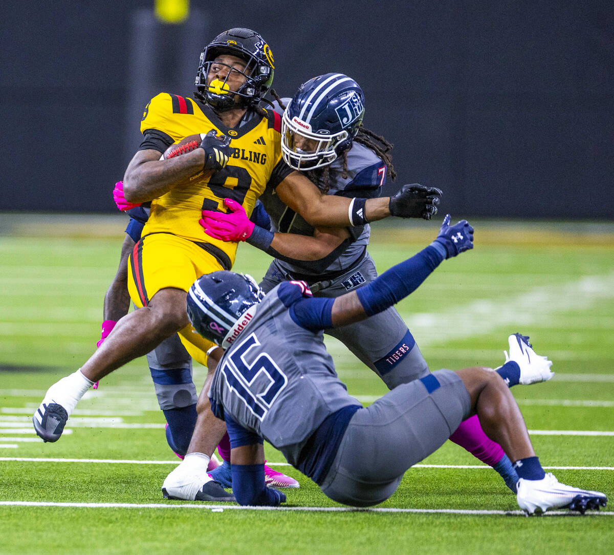 Grambling State Tigers tight end Covadis Knighten (9) is double teamed by Jackson State Tigers ...