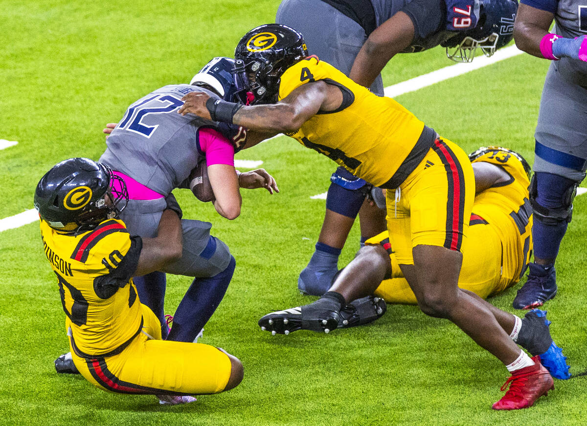Jackson State Tigers quarterback Parker Stofa (12) is sacked by Grambling State Tigers defensiv ...