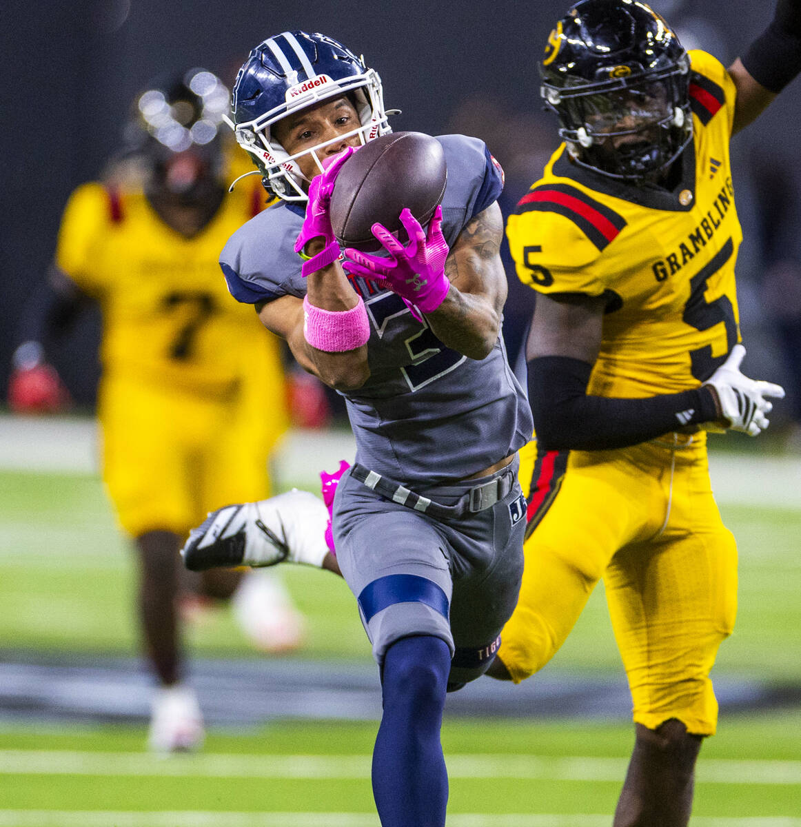 Jackson State Tigers wide receiver Nate Rembert (3) extends to secure a long pass over Gramblin ...