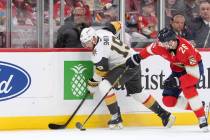 Florida Panthers defenseman Uvis Balinskis (26) and Vegas Golden Knights right wing Reilly Smit ...