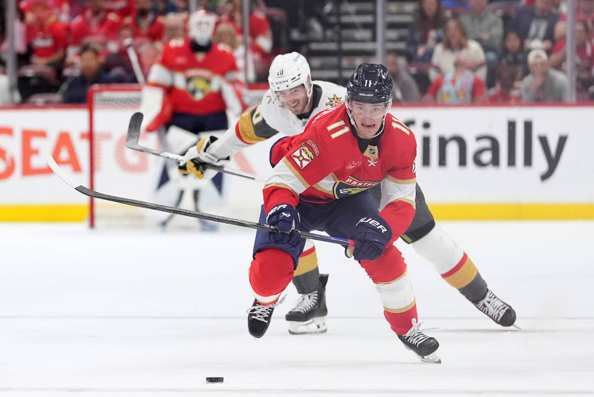 Florida Panthers right wing Mackie Samoskevich (11) is pursued by Vegas Golden Knights center C ...