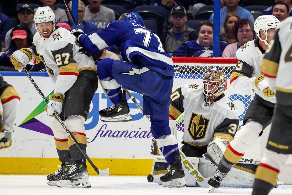 Vegas Golden Knights goaltender Carl Lindbom (30) makes a save in his NHL debut as teammate She ...