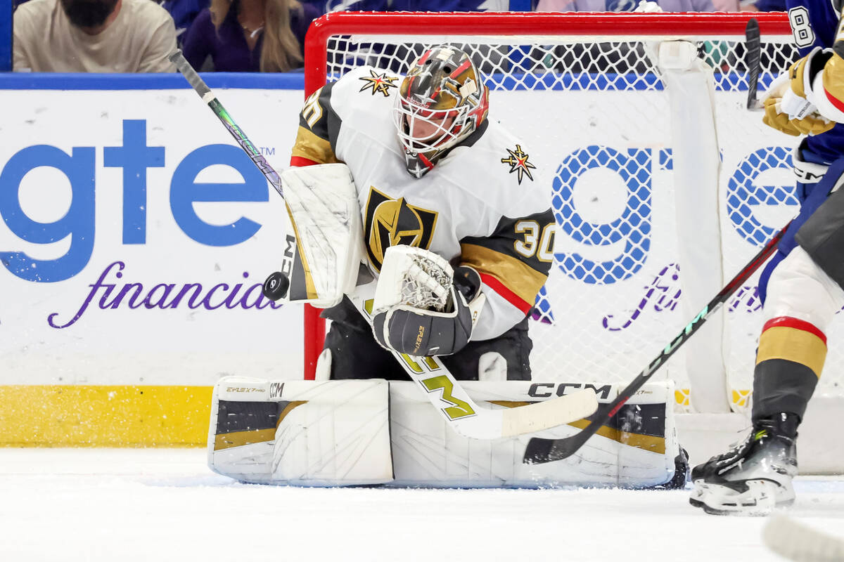 Vegas Golden Knights goaltender Carl Lindbom makes a save against the Tampa Bay Lightning durin ...