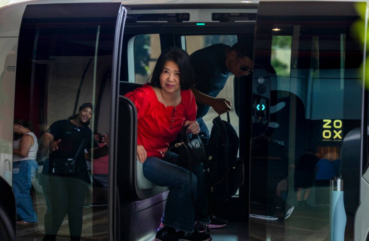 Passengers arrive in their Zoox vehicle at Resorts World on Friday, Sept. 5, 2025, in Las Vegas ...