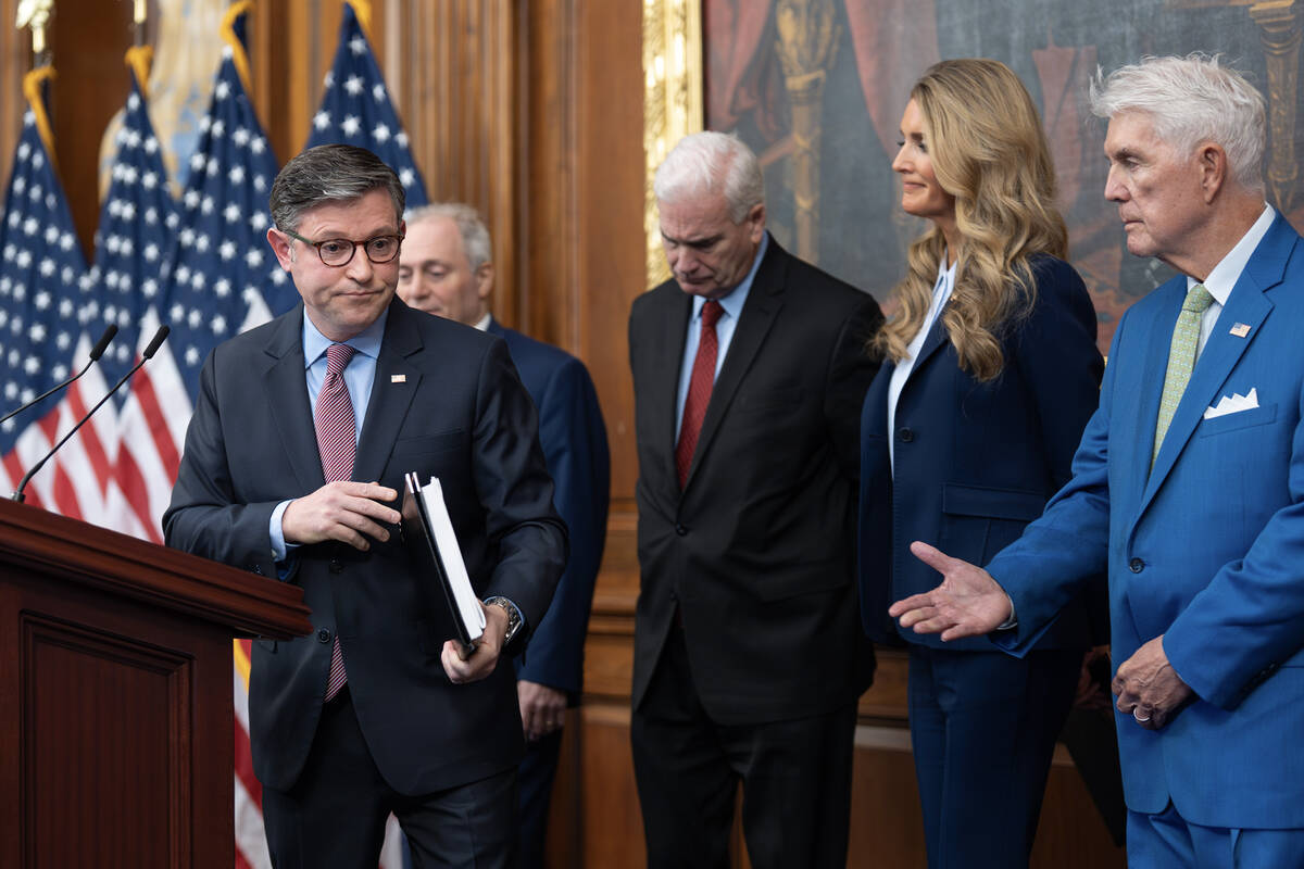 Speaker of the House Mike Johnson, R-La., from left, wraps up a news conference with Majority L ...