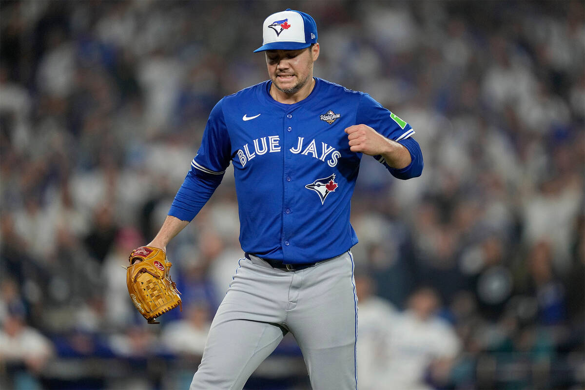 Toronto Blue Jays pitcher Brendon Little reacts to an out during the 17th inning in Game 3 of b ...