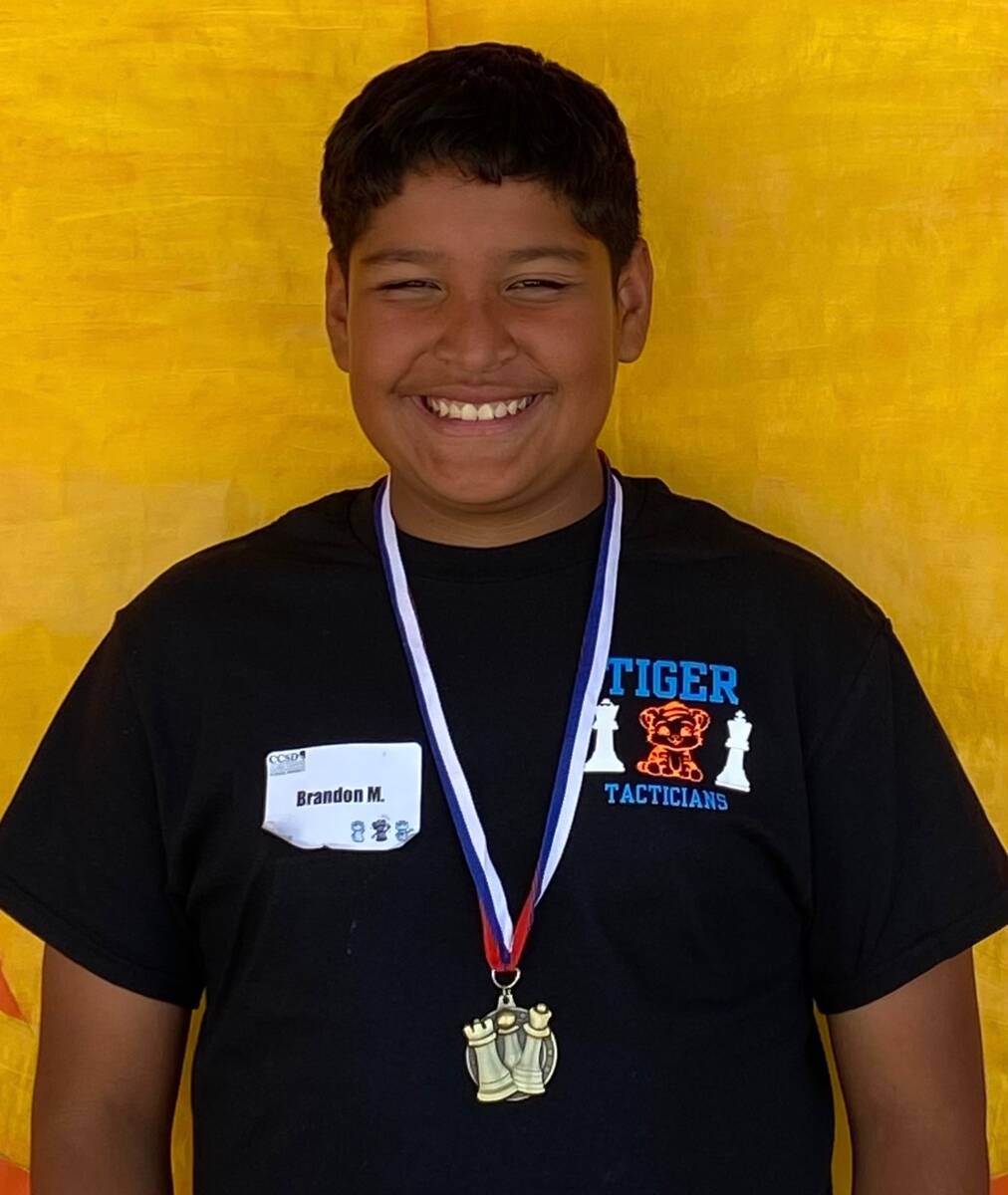 Brandon Martinez, 10, won the chess tournament at his elementary school, Myrtle Tate, before hi ...