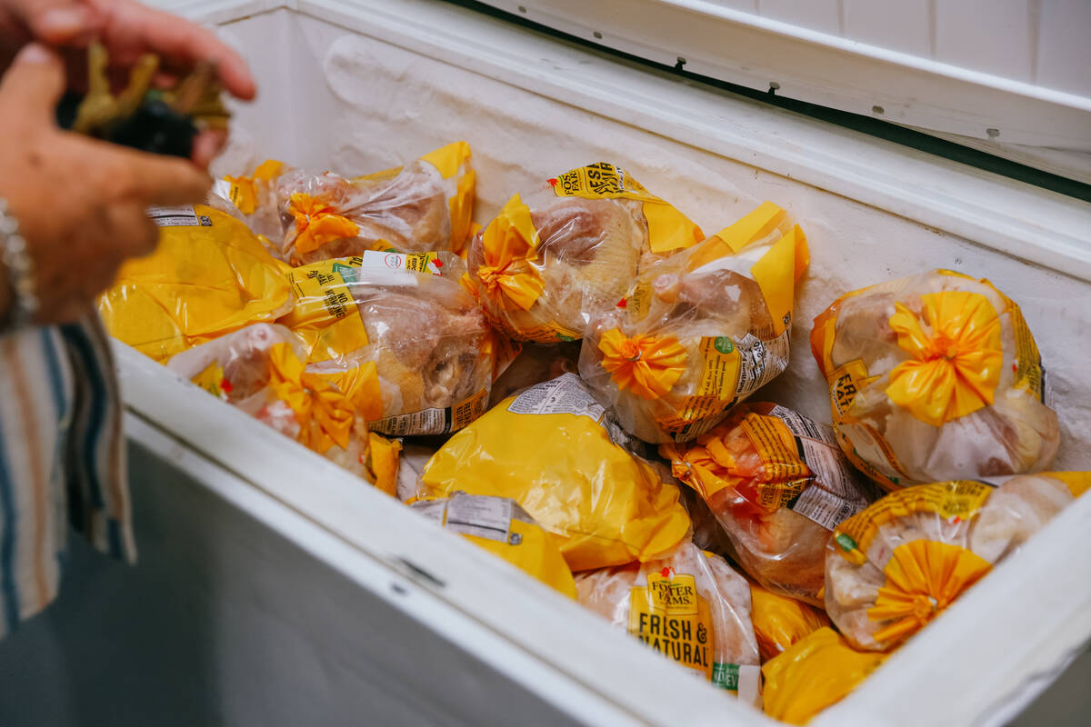 Packaged whole chickens await distribution at City Impact Urban Food Bank on Tuesday, Oct. 28, ...