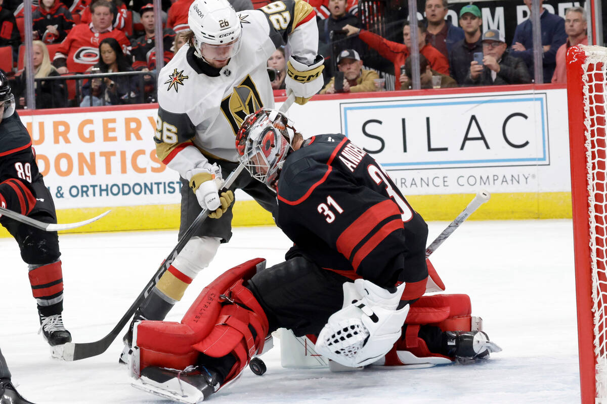 Carolina Hurricanes goaltender Frederik Andersen (31) stops a shot by Vegas Golden Knights righ ...