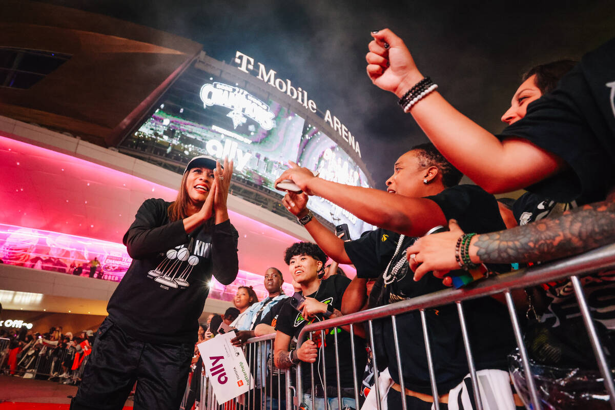 Aces president Nikki Fargas claps with fans during the Aces’ championship parade on the ...