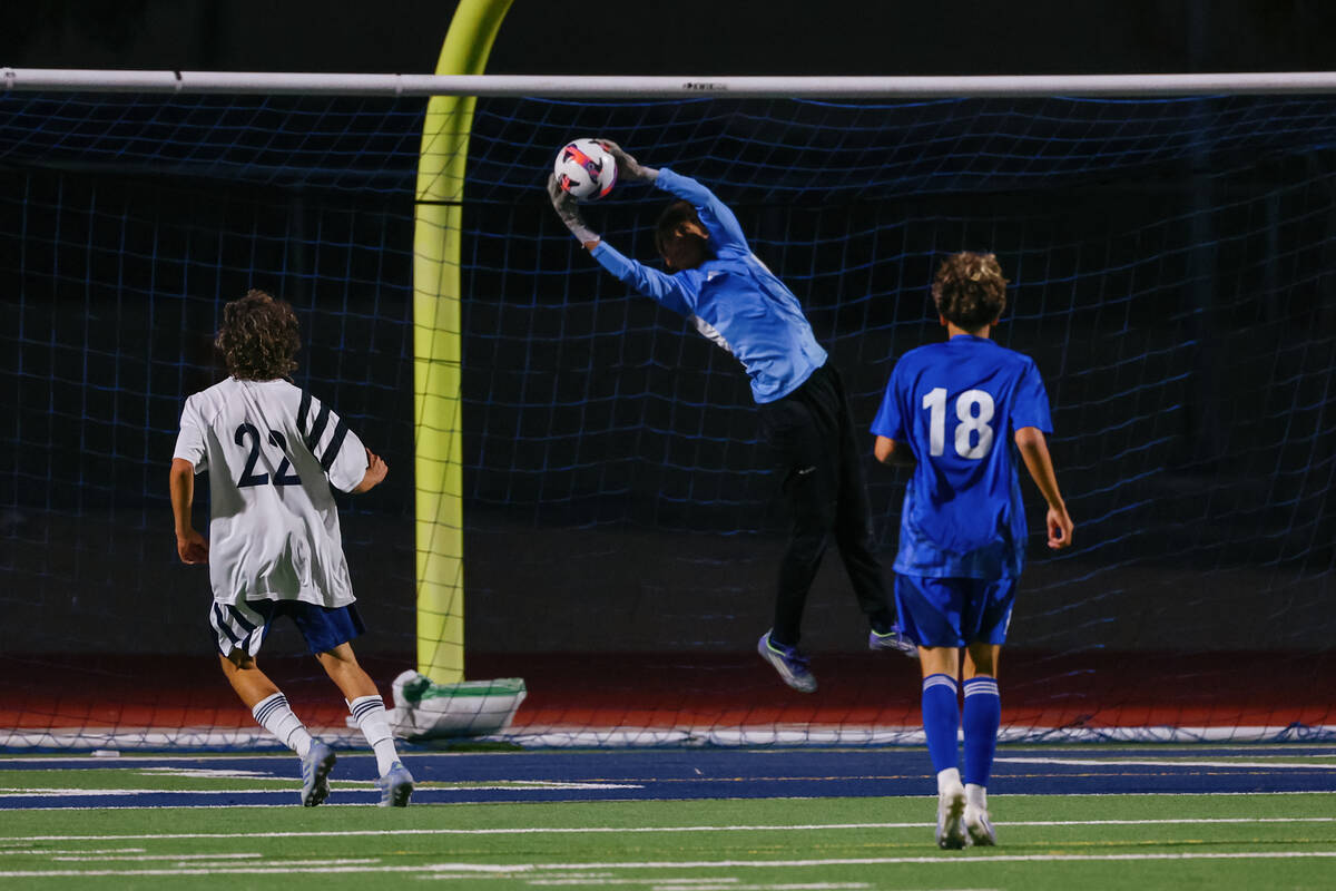 Shadow Ridge goalkeeper Nicklas Yzerman Evans (0) makes a save in a first round game of 4A boys ...