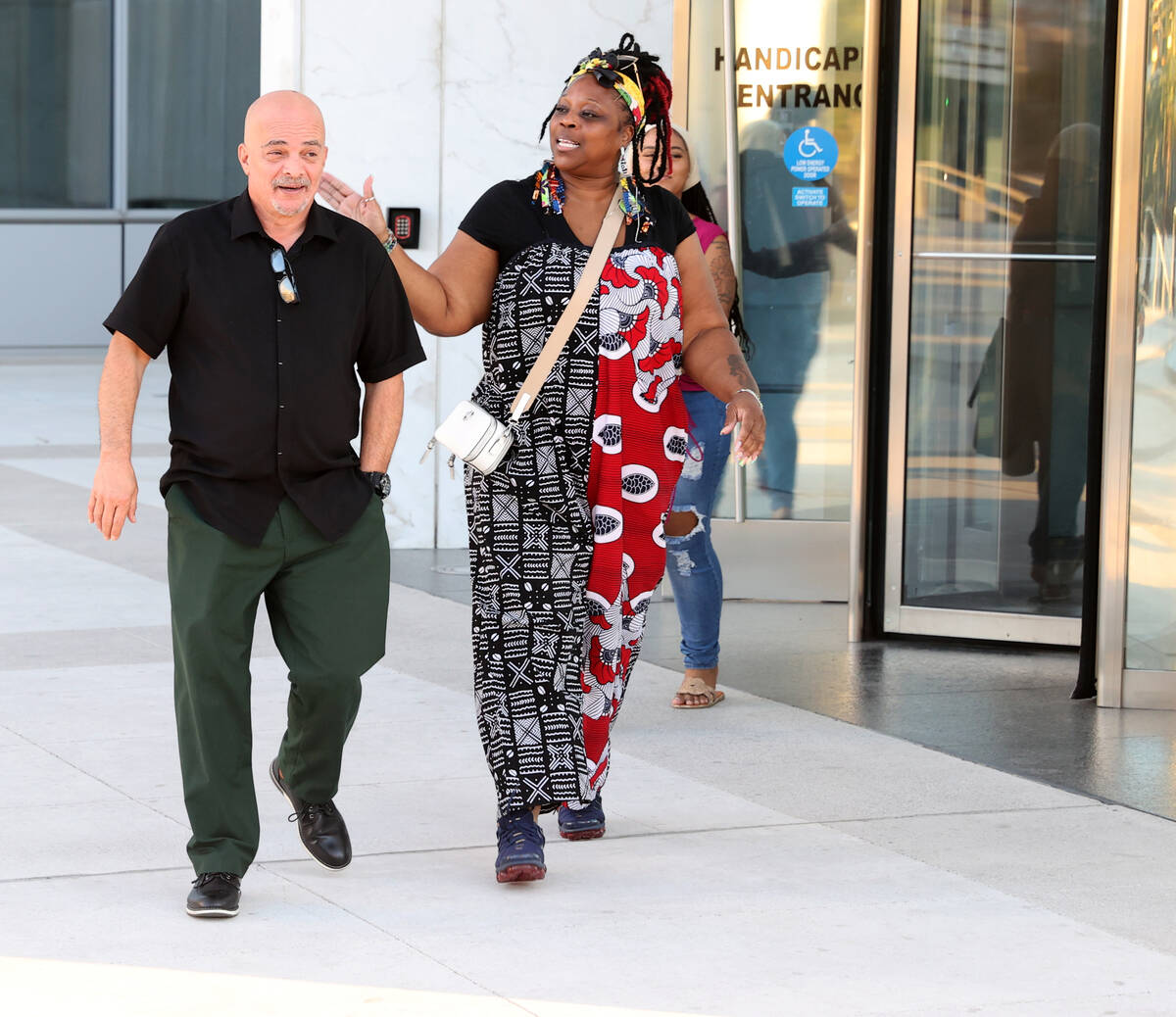 Jorge Gomez, father of Jorge Gomez, left, leaves Lloyd George U.S. Courthouse in Las Vegas Wedn ...