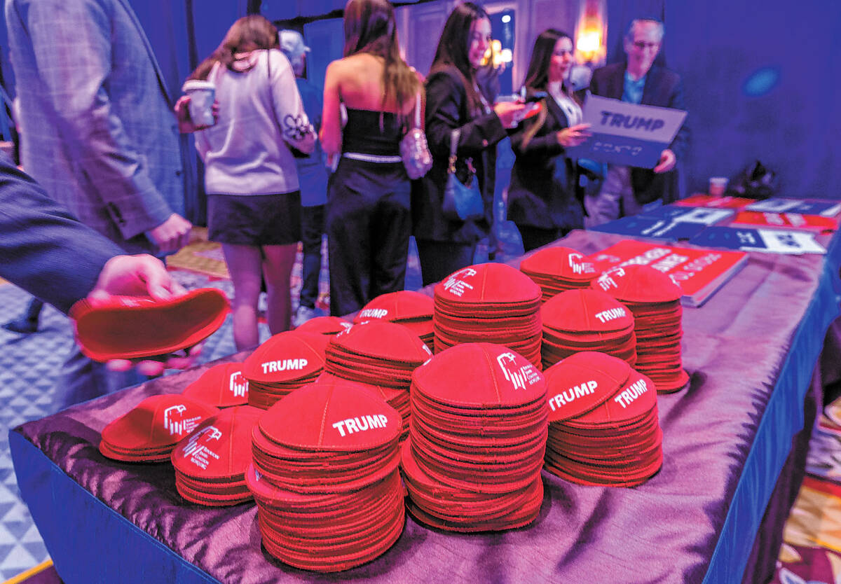 Stacks of yarmulke are available for the taking stamped with Trump and the Republican Jewish Co ...