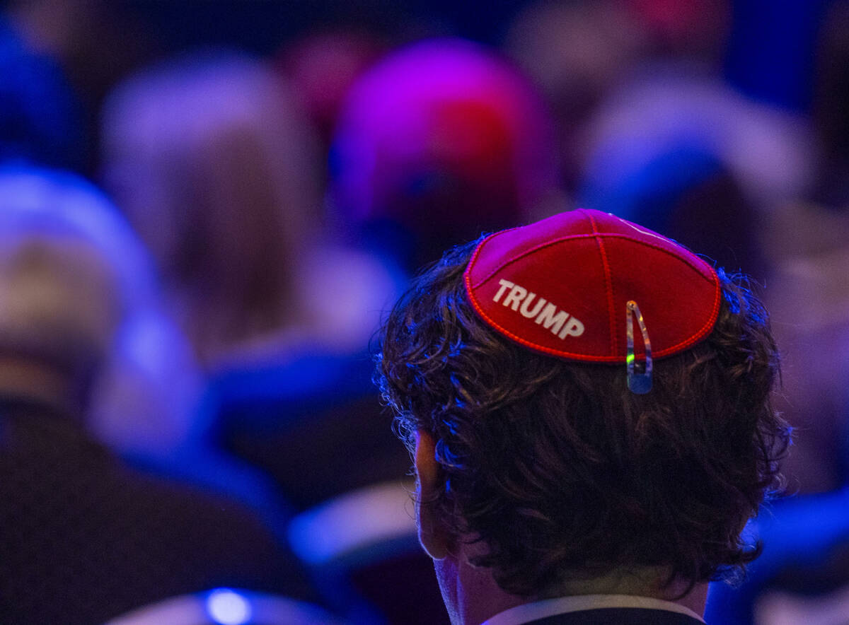 An attendee wears a yarmulke with Trump labeled on it during the Republican Jewish Coalition’ ...