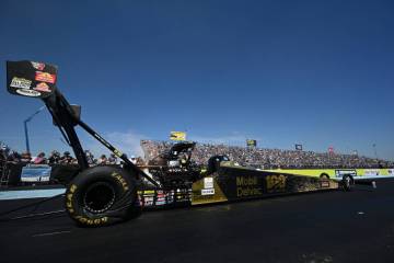 In this photo provided by the NHRA, Doug Kalitta extended his Top Fuel points lead on Sunday, O ...