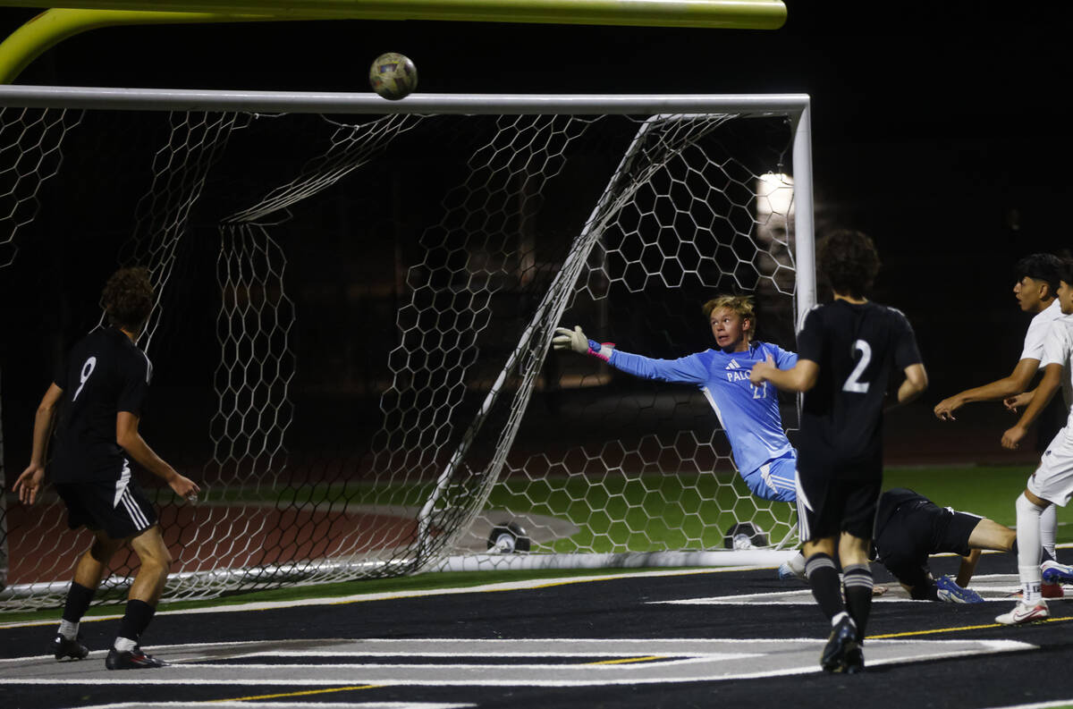 The ball flies past the goal as Palo Verde goalkeeper Landon Blanchard (27) defends against Las ...