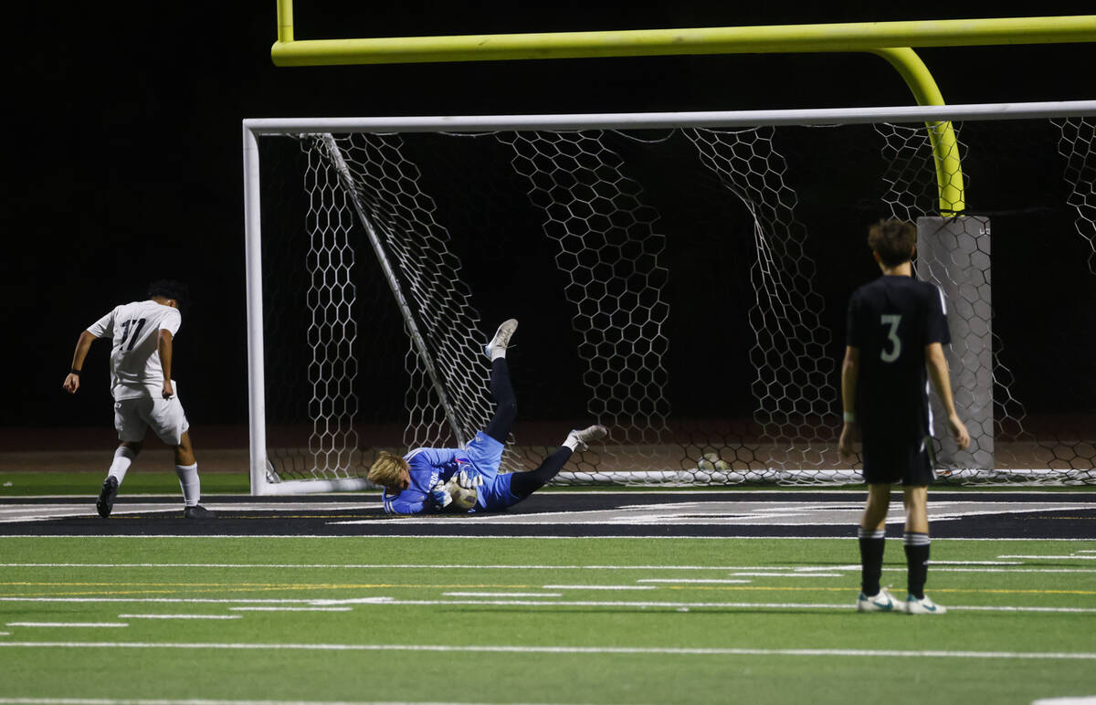 Palo Verde goalkeeper Landon Blanchard (27) stops the ball during a 5A boys soccer Southern Reg ...
