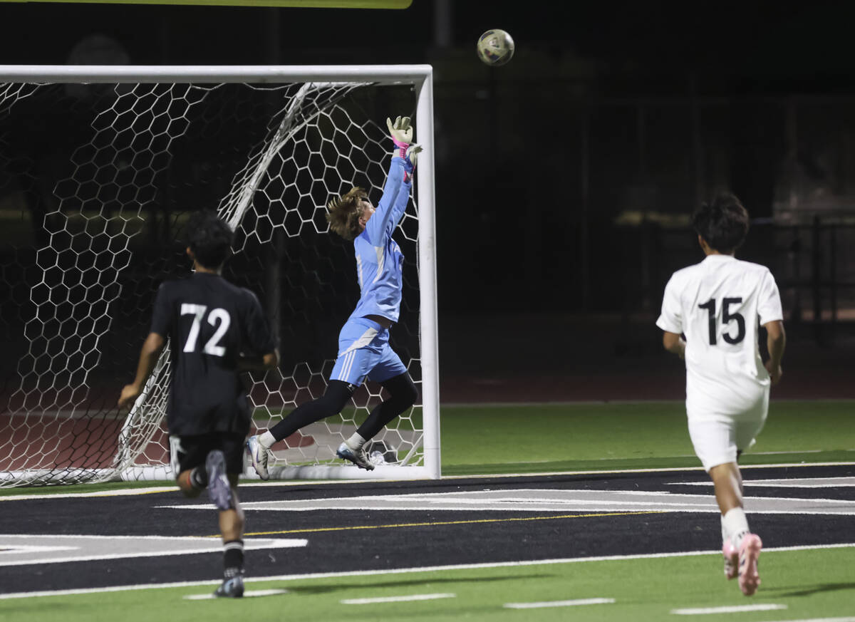 Palo Verde goalkeeper Landon Blanchard (27) blocks a shot from Las Vegas during a 5A boys socce ...