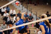 Bishop Gorman right side hitter Charlie Wilson (5) hits the ball over the net during a 5A girls ...