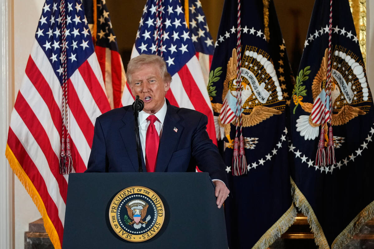 President Donald Trump speaks to business leaders at a dinner event in Tokyo, Japan, Tuesday, O ...