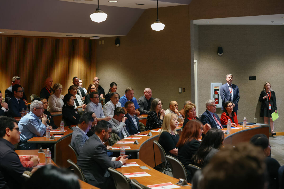 Guests listen to speakers during the ribbon-cutting ceremony for the UNLV School of Dental Medi ...