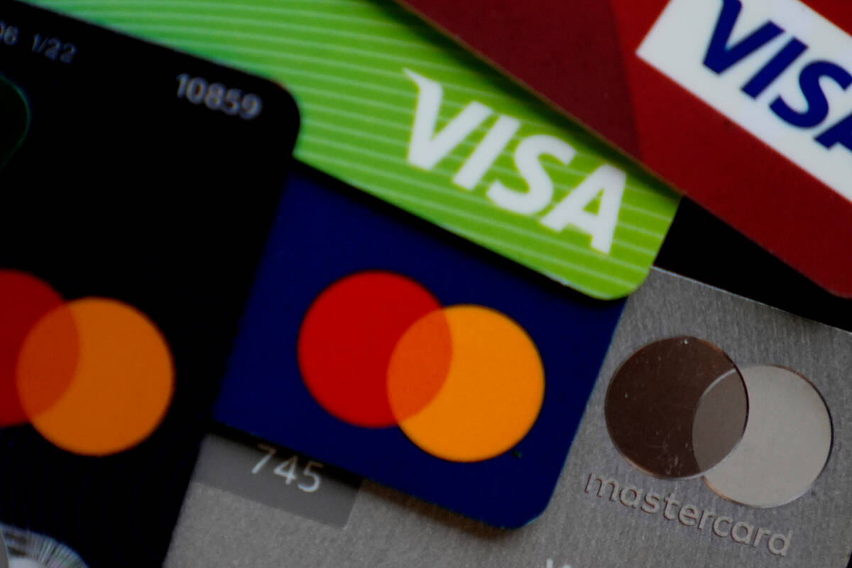 Several VISA and MASTER credit cards are shown in Buffalo Grove, Ill., Feb. 8, 2024. (AP Photo/ ...