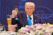 President Donald Trump toasts with state leaders during a dinner event hosted by South Korean P ...