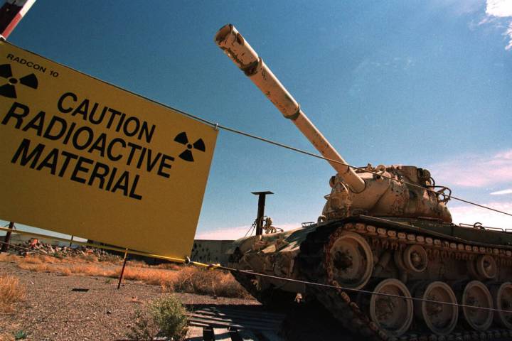 An M-48 tank which fired uranium-tipped shells in the 1970s sits at the Nevada Test Site on Aug ...