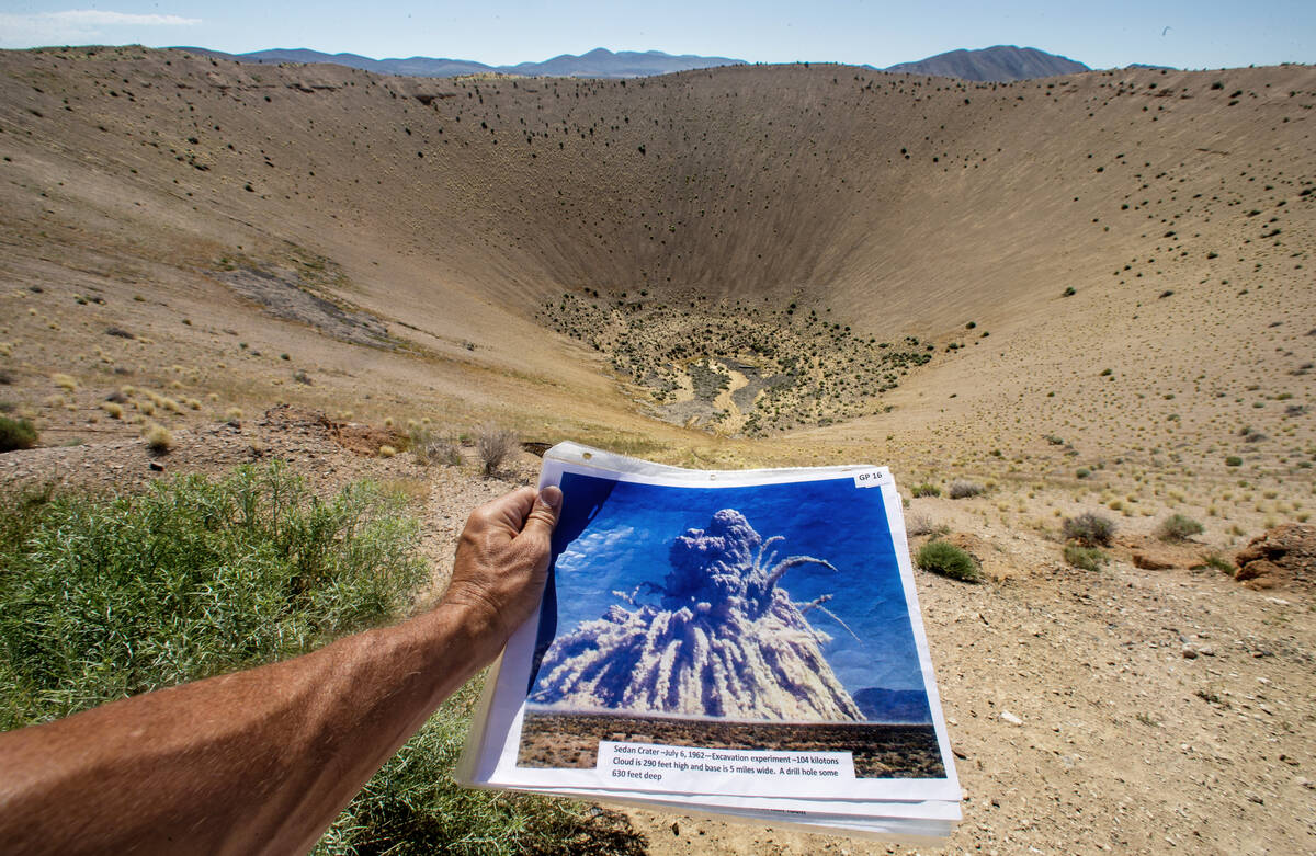 The Sedan crater and a photo of the July 6, 1962, underground nuclear blast that created the cr ...