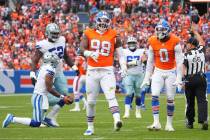 Denver Broncos defensive end John Franklin-Myers (98) celebrates a sack against the Dallas Cowb ...