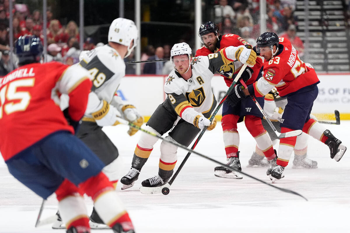 Vegas Golden Knights center Jack Eichel (9) controls the puck during the first period of an NHL ...