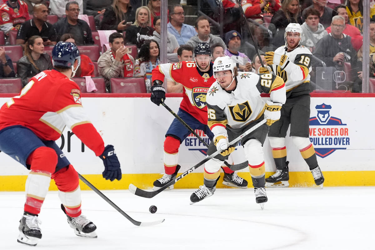 Vegas Golden Knights right wing Alexander Holtz (26) looks for a shot past Florida Panthers def ...