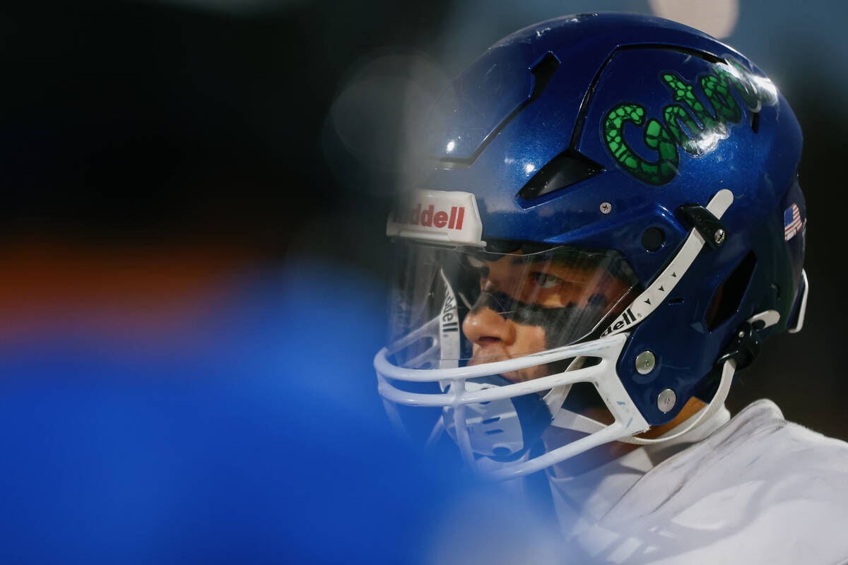 Green Valley wide receiver/defensive back Roman Adams (11) looks to the referee during the coin ...