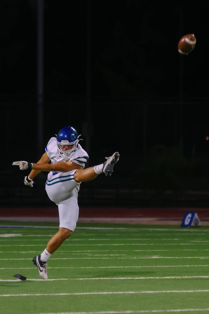 Green Valley kicker Malte Hamann (54) kicks off during the Class 5A Southern Region playoff foo ...