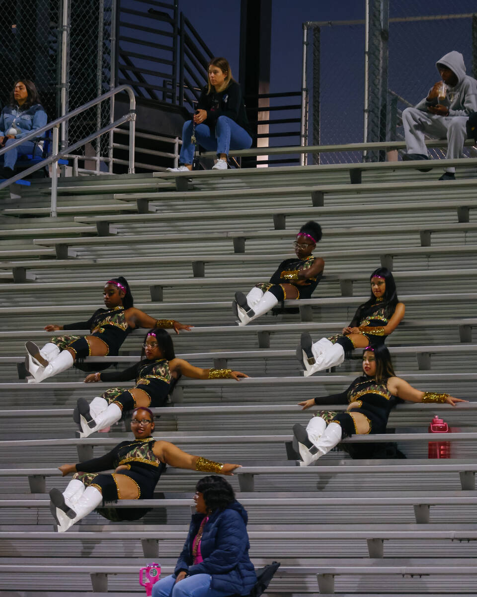 The Desert Pines Jaguarettes sit in the bleachers during the Class 5A Southern Region playoff f ...