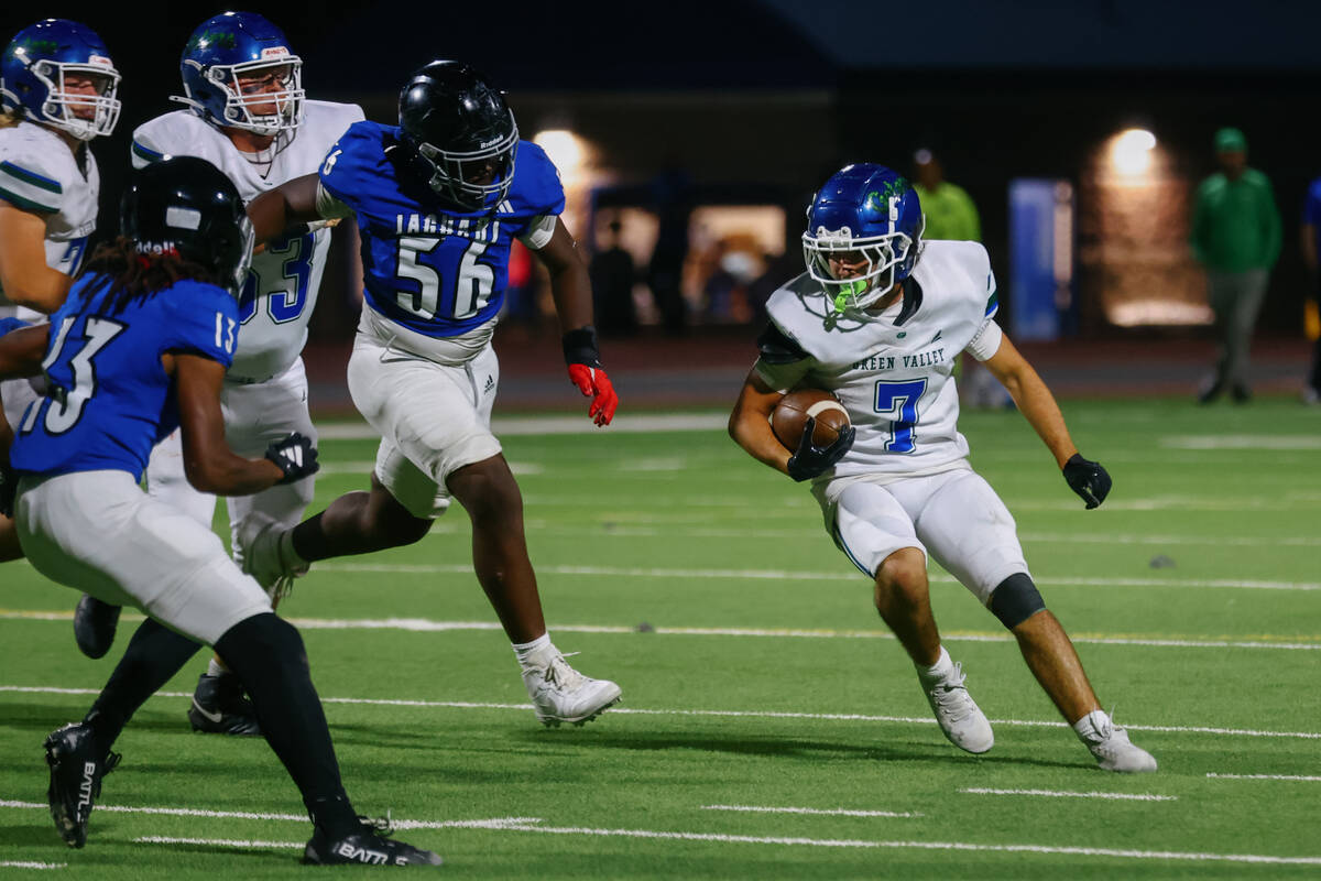 Green Valley wide receiver Sonny Uranich (7) runs with the ball during the Class 5A Southern Re ...