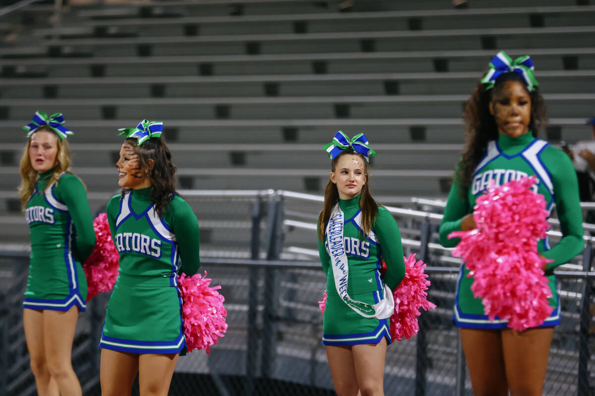 Green Valley cheerleaders stand on their boxes on the sidelines during the Class 5A Southern Re ...