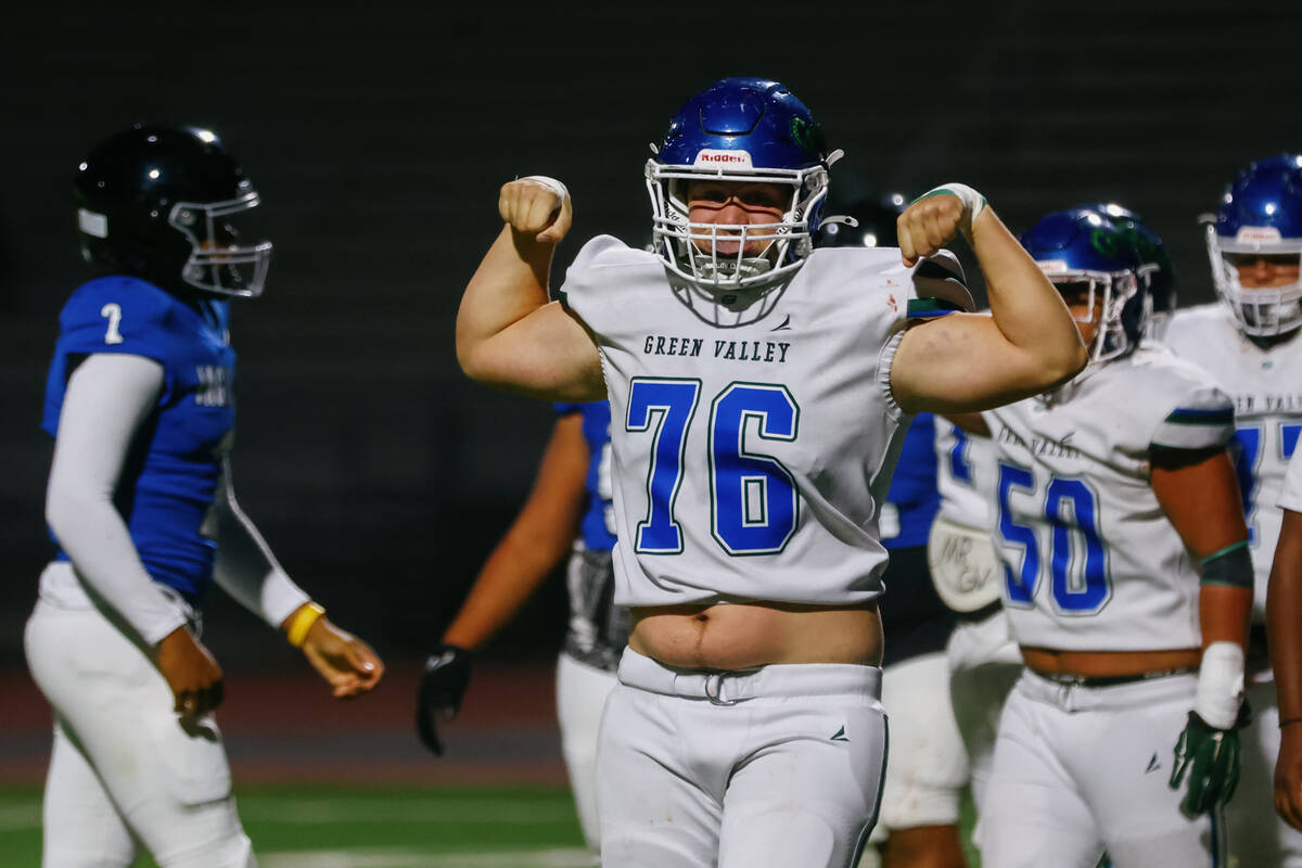 Green Valley defensive lineman Jonah Mancuso (76) celebrates making a stop during the Class 5A ...