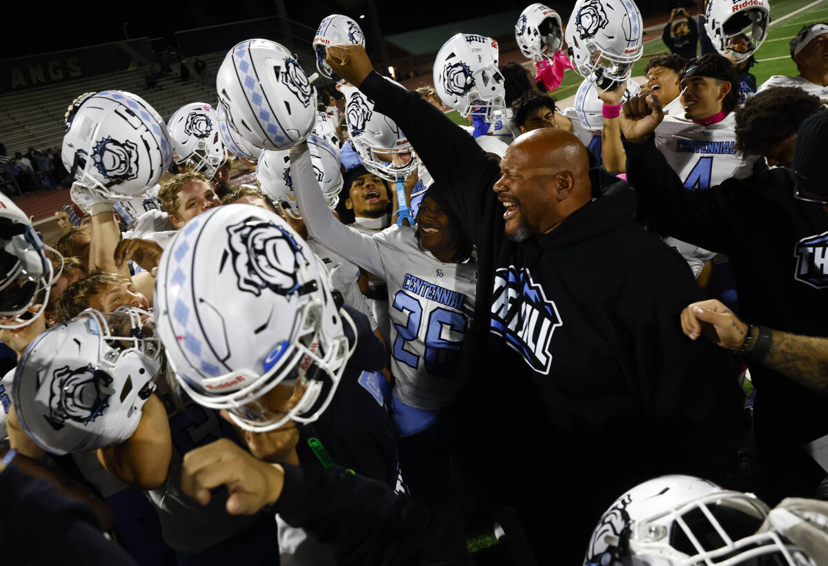 Centennial celebrates after defeating Shadow Ridge in a 5A Southern Region high school football ...