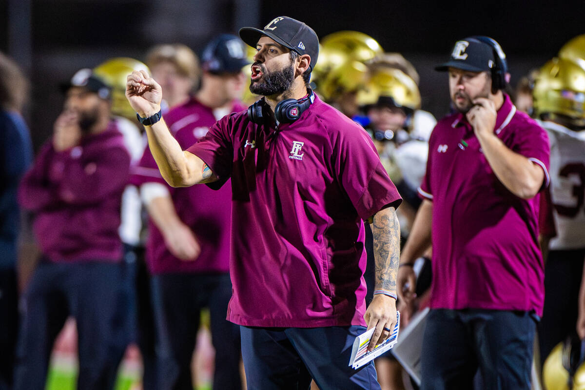 Faith Lutheran head coach Jay Staggs coaches his team from the sidelines during a class 5A Sout ...